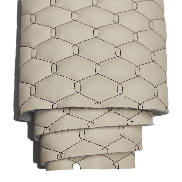 cuir-ecologique-geo-couleur-beige-cousu-avec-des-fils-marron-metrage-145-cm-222.jpg