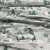 christmas-cotton-fabric-by-the-meter-width-160-cm-green-elves-on-gray2.gif